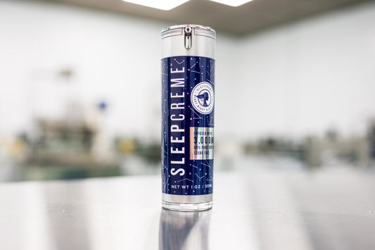 bottle of sleepcreme sleep topical designed to help you relax and sleep