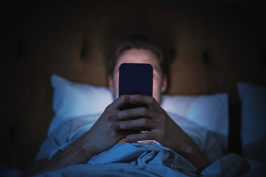 Why Using Your Phone in Bed Could Be Disrupting Your Sleep. Try SleepCreme natural CBD cream.