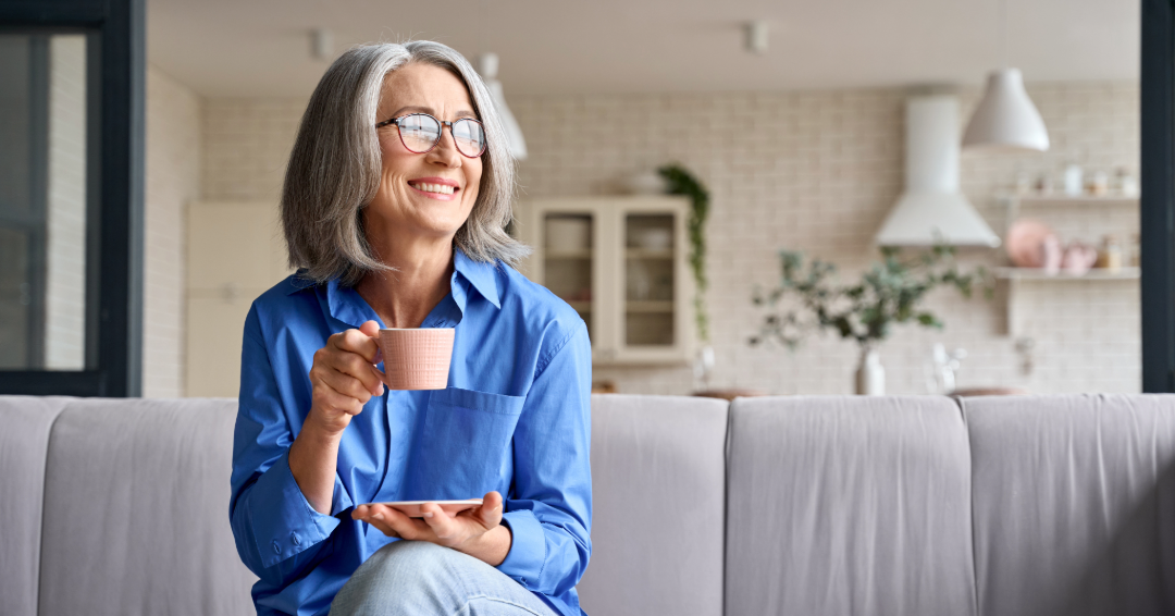 older woman enjoying a cup of coffee